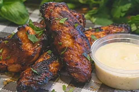BBQ Wings: tender wings in a rich BBQ sauce